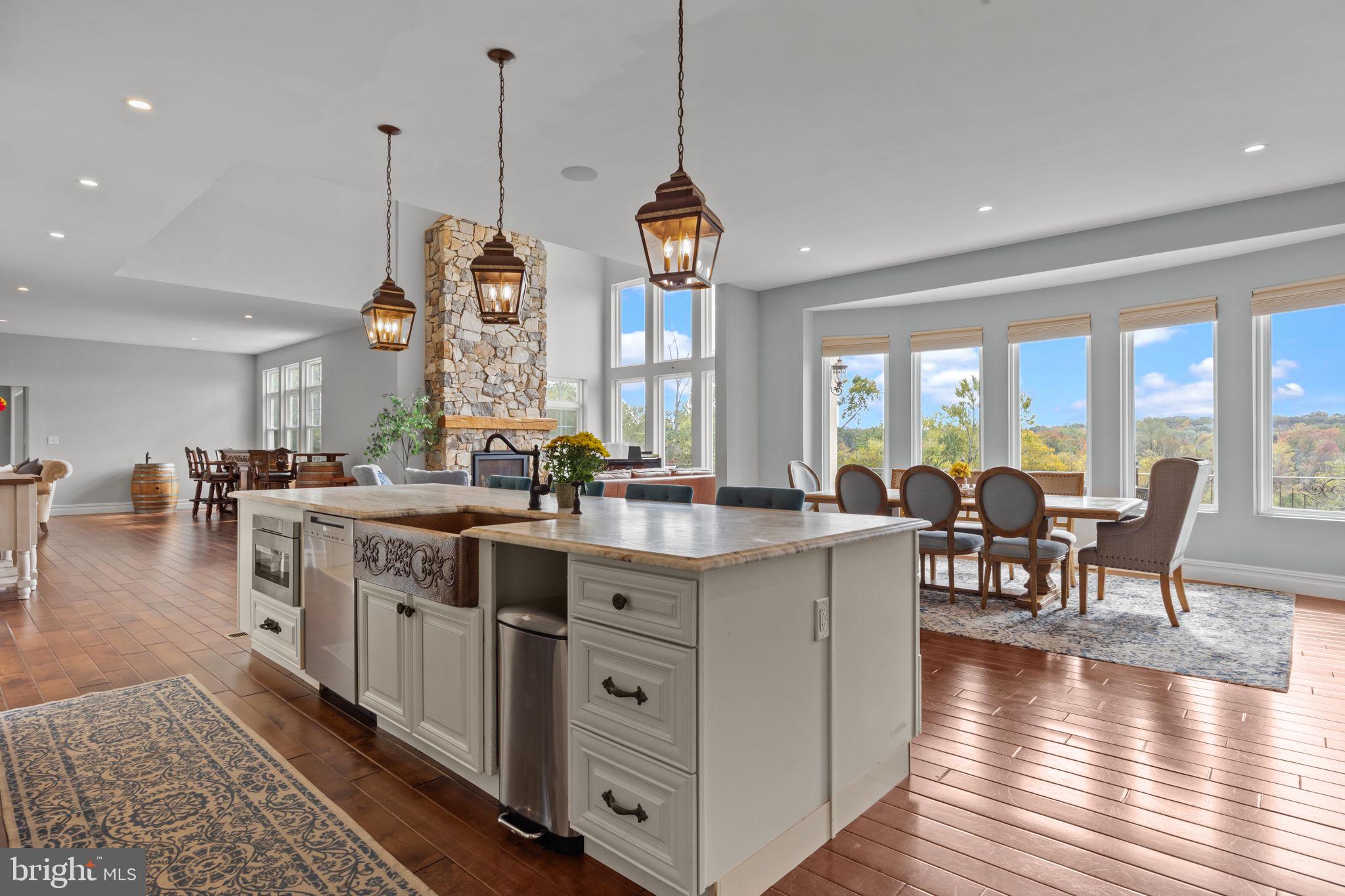 274 Pineville Road Newtown, PA 18940 - Photo 25 of 109 a view of a kitchen with kitchen island granite countertop a stove a sink a island and windows