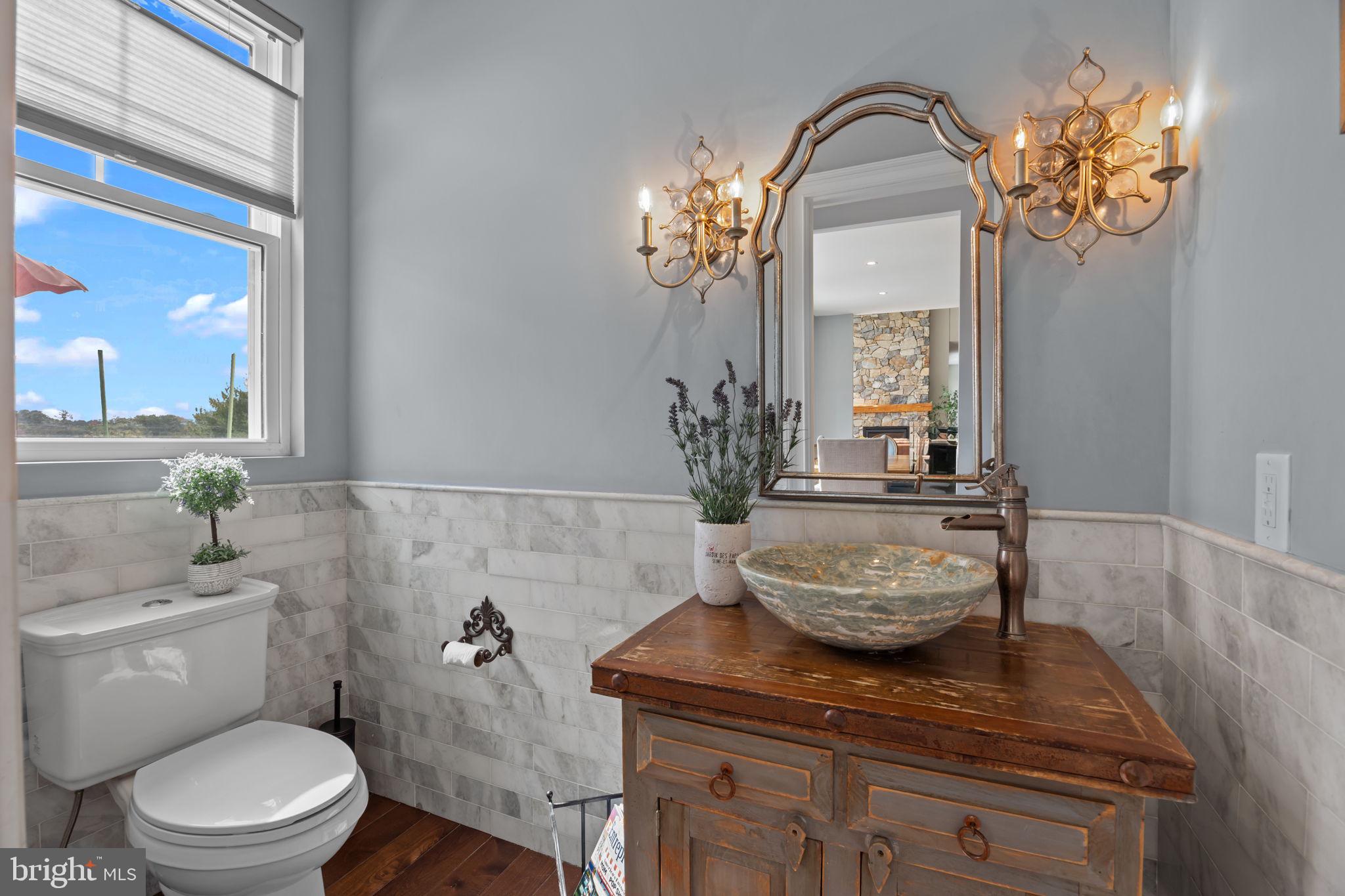 274 Pineville Road Newtown, PA 18940 - Photo 30 of 109 a bathroom with a toilet a sink and mirror