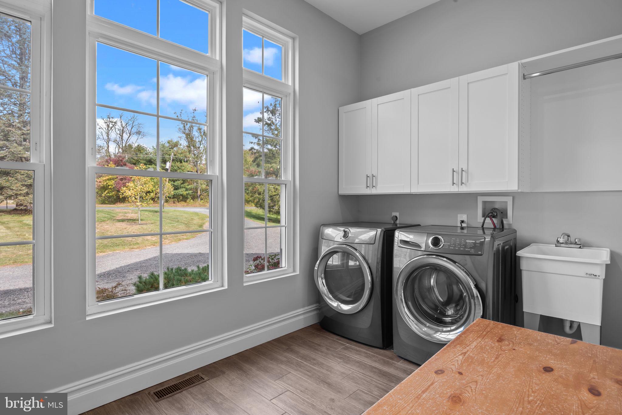 274 Pineville Road Newtown, PA 18940 - Photo 35 of 108 a utility room with sink dryer and washer