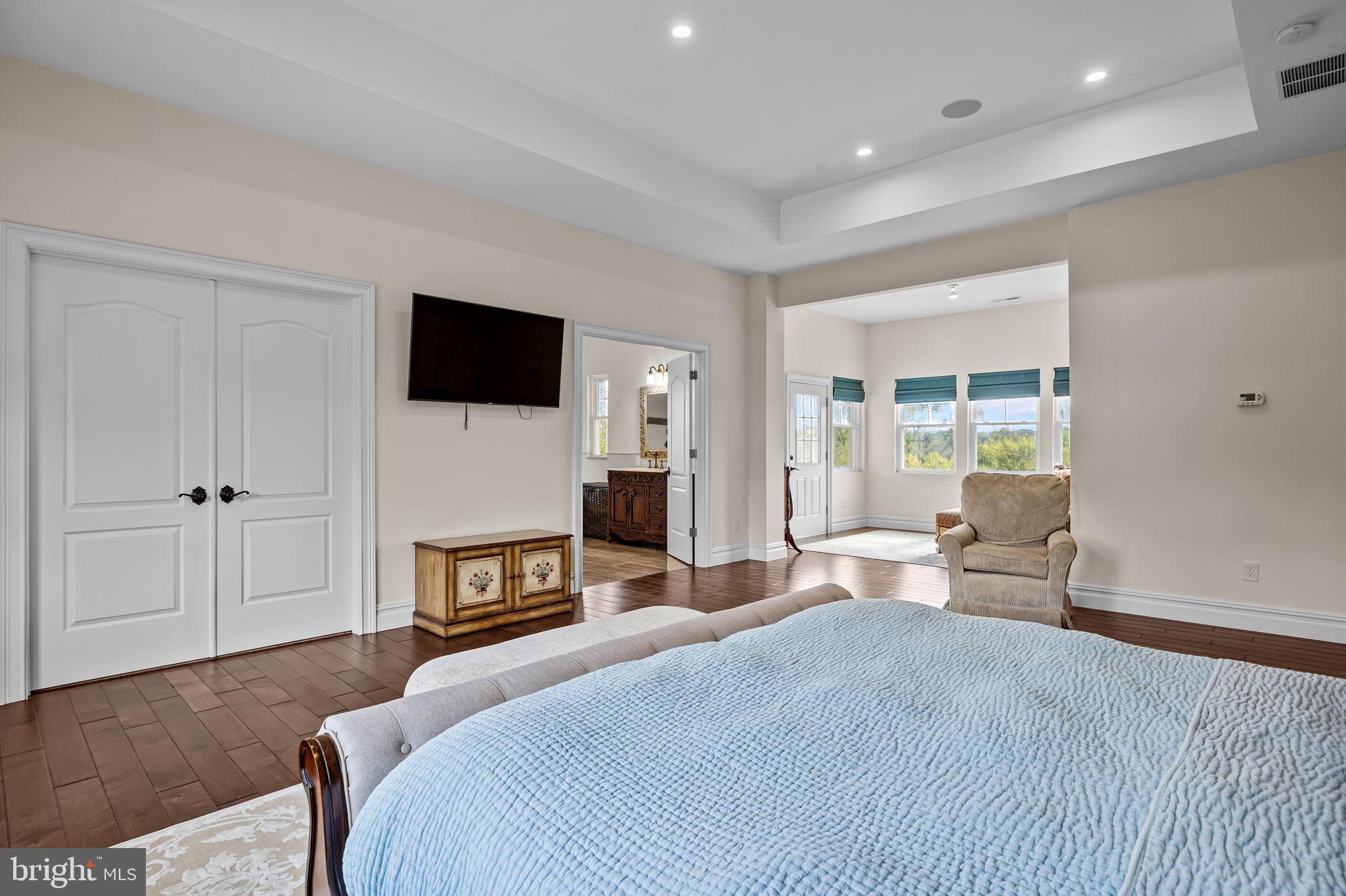 274 Pineville Road Newtown, PA 18940 - Photo 58 of 108 a bedroom with a bed and a flat screen tv