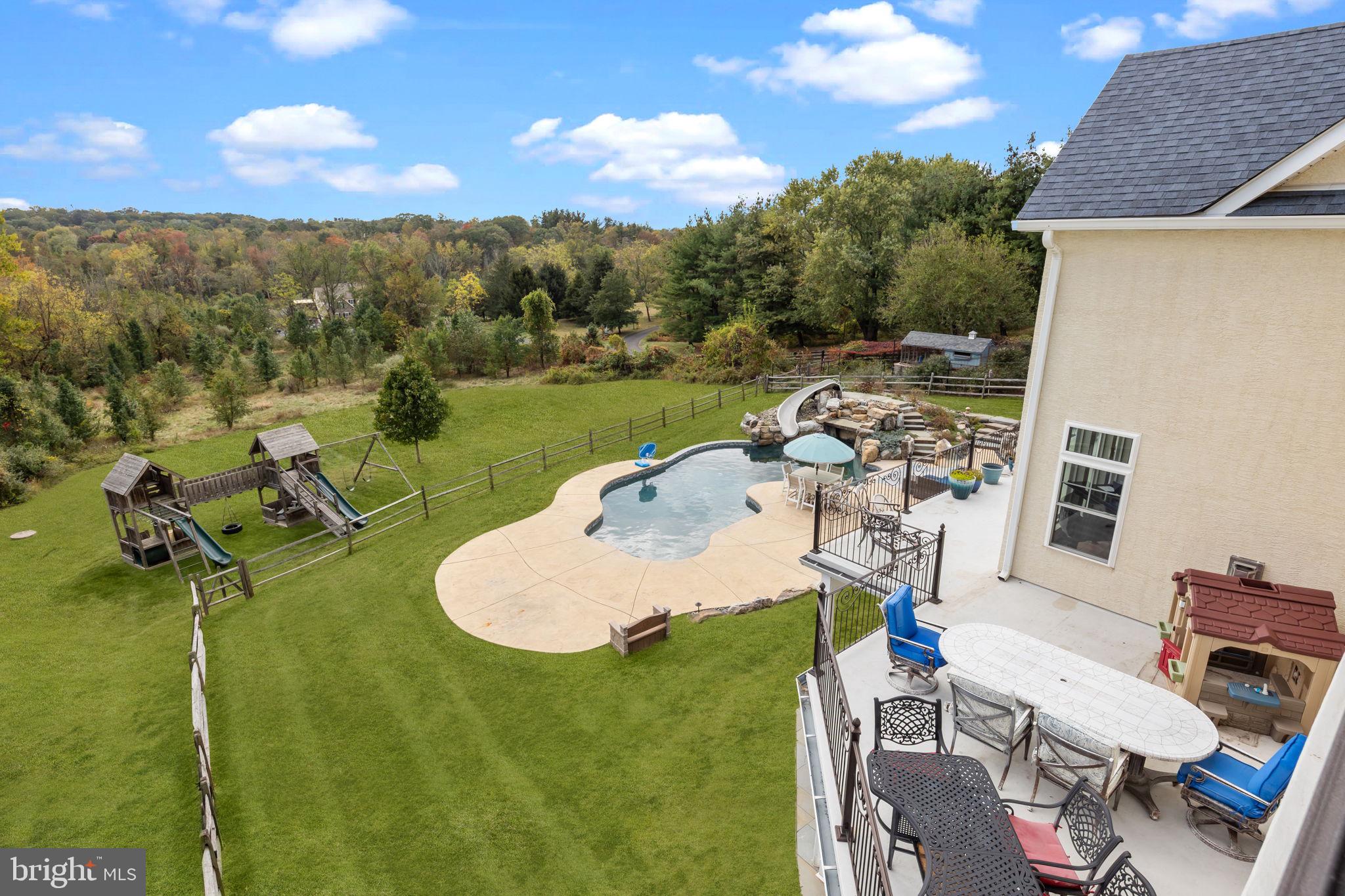 274 Pineville Road Newtown, PA 18940 - Photo 65 of 109 a view of a swimming pool with a patio