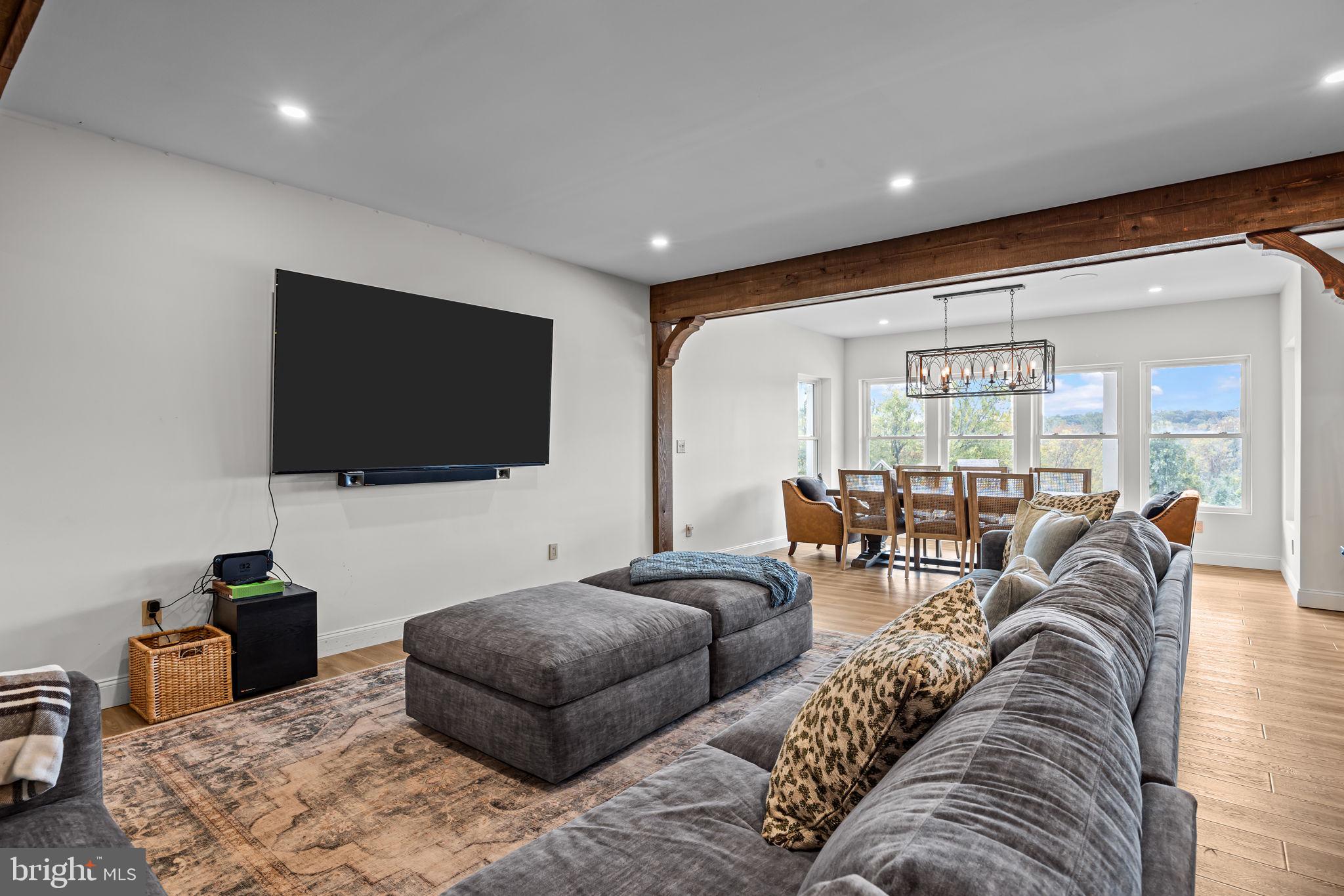 274 Pineville Road Newtown, PA 18940 - Photo 76 of 108 a living room with furniture and a flat screen tv