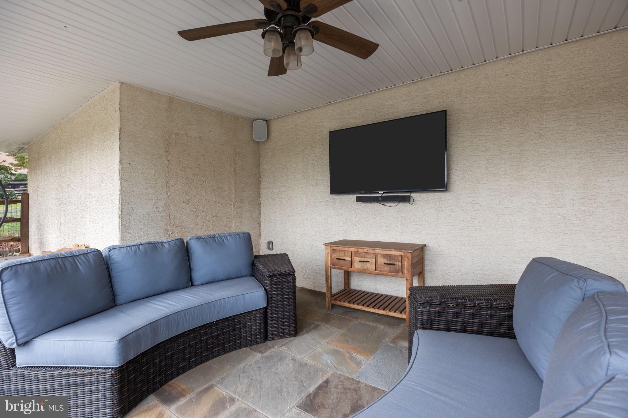 274 Pineville Road Newtown, PA 18940 - Photo 87 of 108 a living room with furniture and a flat screen tv