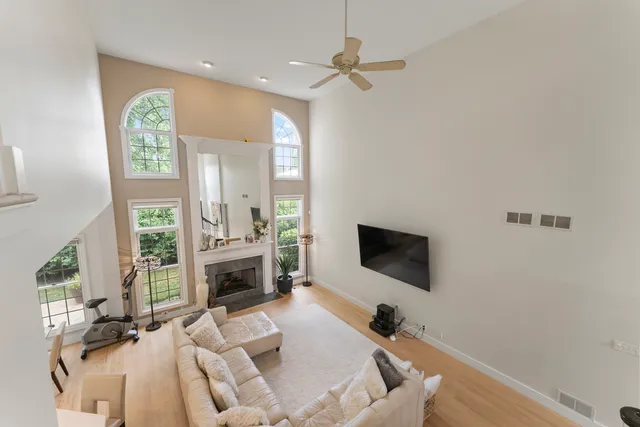 a room with a chair and a flat screen tv