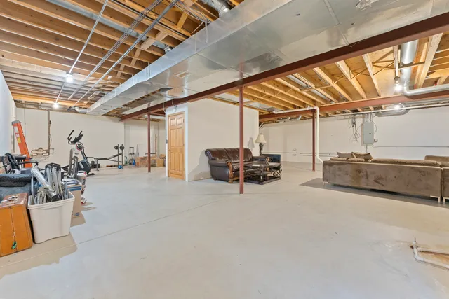 a bathroom with a sink toilet and a mirror