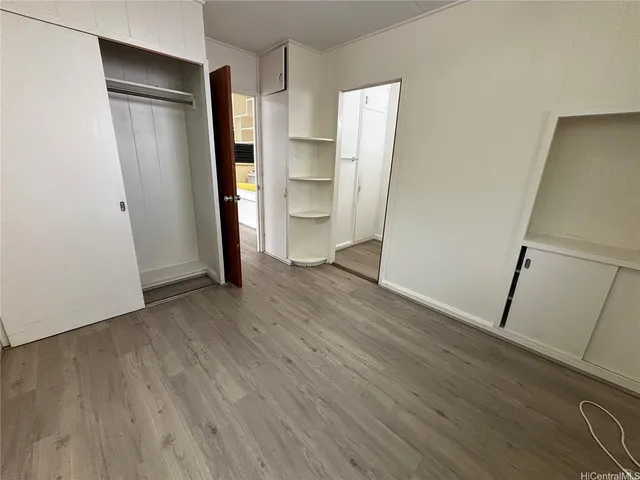 a bathroom with a toilet and a bathtub