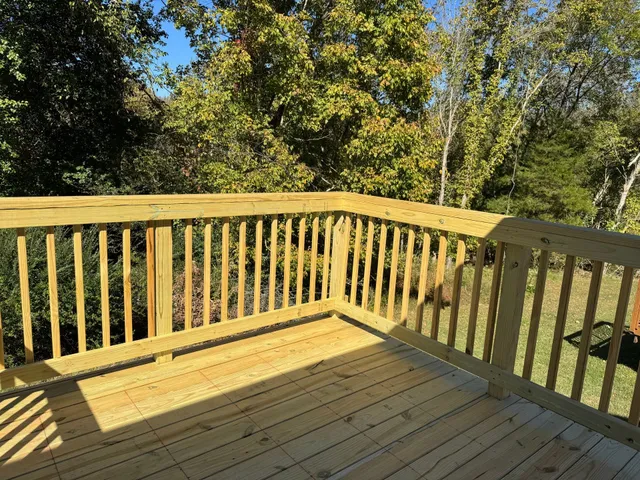 a balcony with wooden floor
