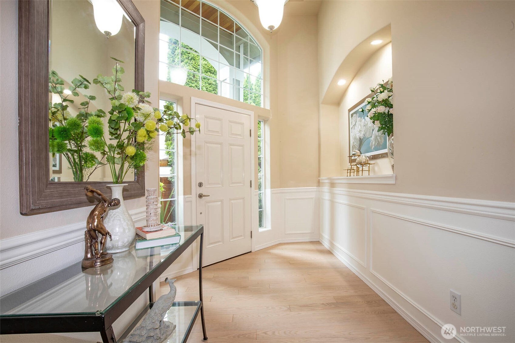a view of a living room and windows