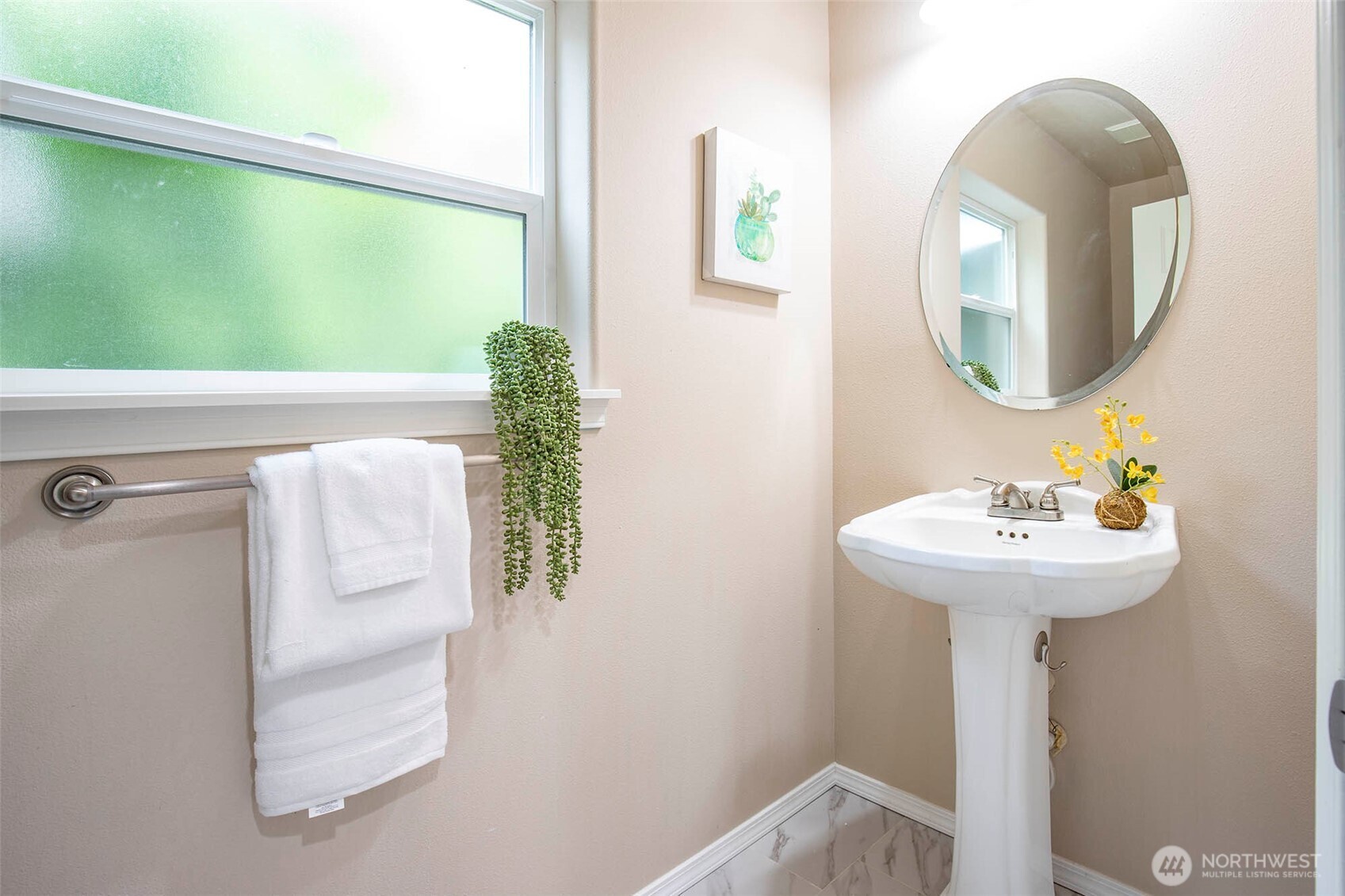 19 198th Place Southeast Bothell, WA 98012 - Photo 14 of 33 a bathroom with a sink a mirror and a window