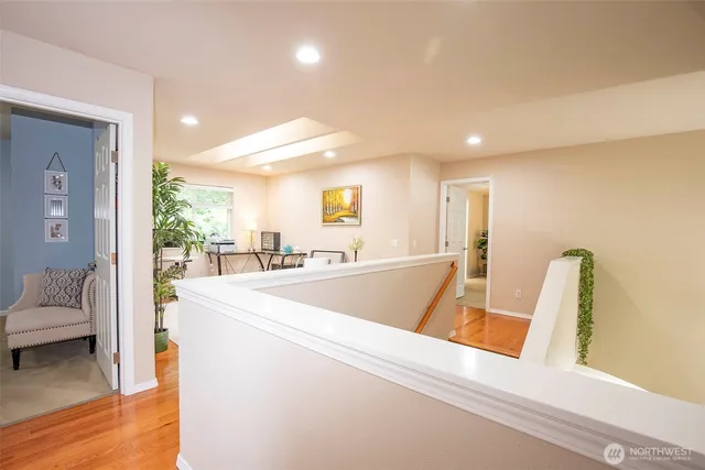 a view of kitchen with furniture and wooden floor