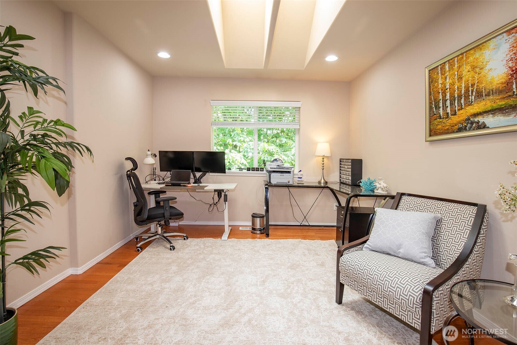 19 198th Place Southeast Bothell, WA 98012 - Photo 26 of 33 a view of a livingroom with workspace and a couch