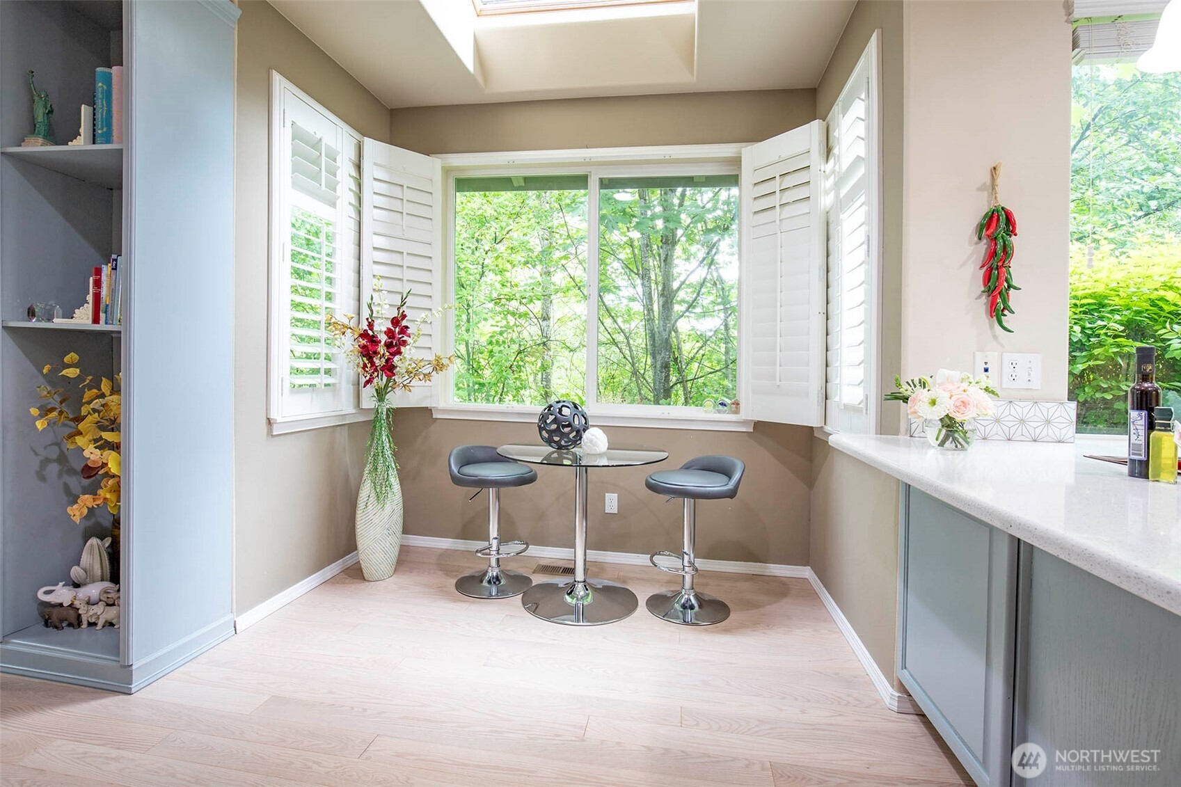 19 198th Place Southeast Bothell, WA 98012 - Photo 8 of 33 a dining room with wooden floor and a table