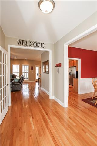 520 Gip Manning Road Clarksville, TN 37042 - Photo 2 of 20 Large, bright entry with hardwood floors. To the right is the formal dining and to the left is the office with glass French doors. Very open and welcoming.