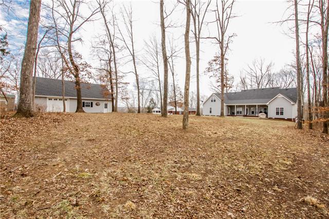 520 Gip Manning Road Clarksville, TN 37042 - Photo 13 of 20 OVER 5 acres of beautiful wooded privacy, detached garage and lots of 4 wheeling trails