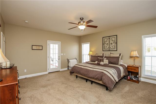 520 Gip Manning Road Clarksville, TN 37042 - Photo 10 of 20 Master bedroom has its own entrance to the covered patio, large walk-in-closet and whirlpool tub