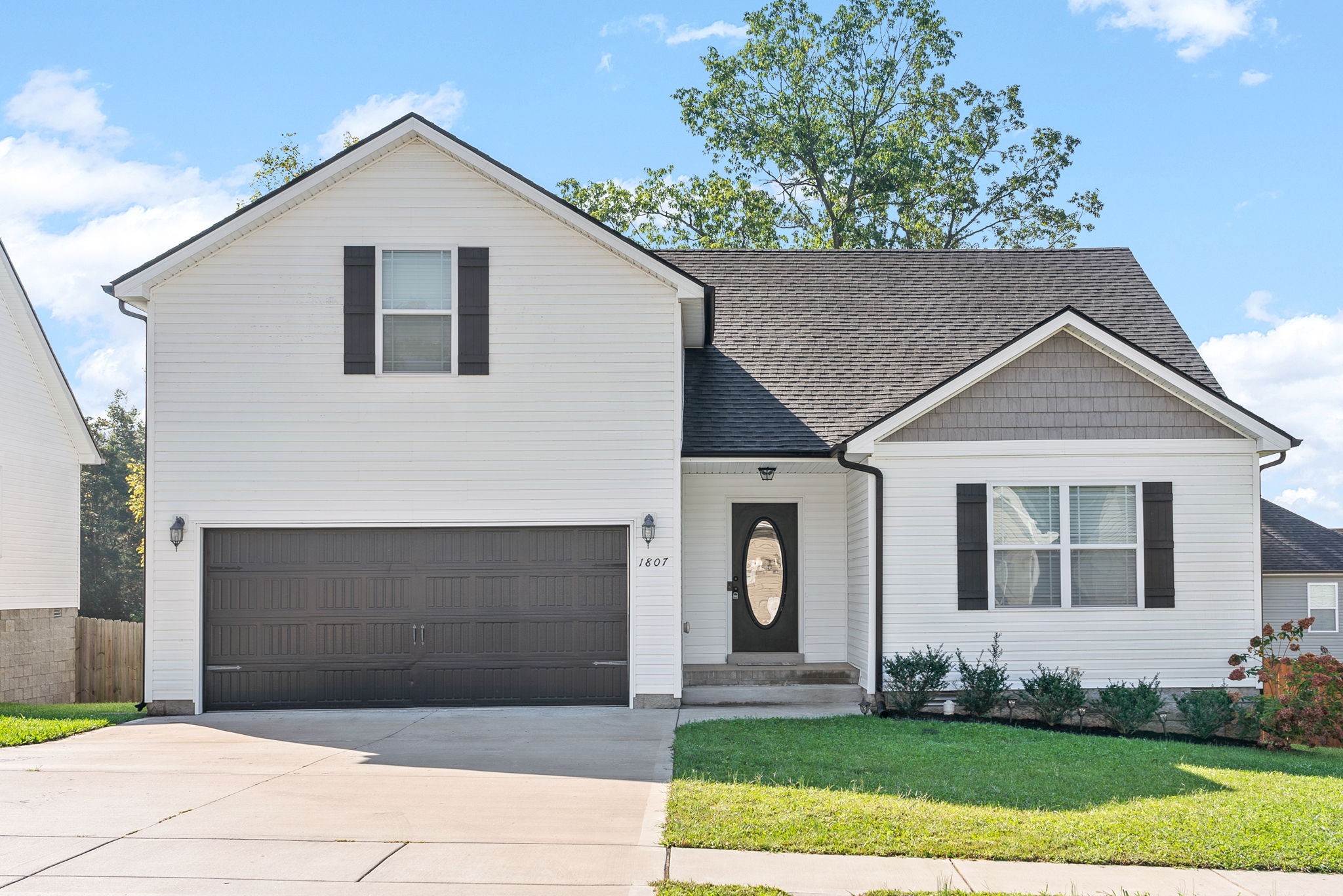 1807 Rains Road Clarksville, TN 37042 - Photo 1 of 39 a front view of a house with a yard