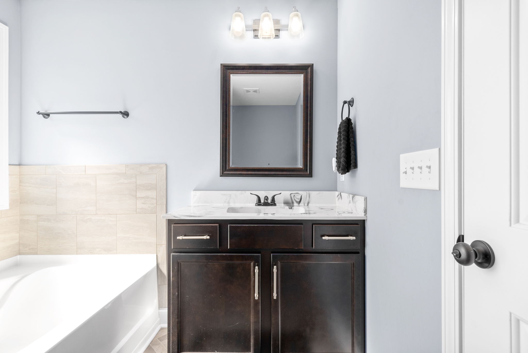 1807 Rains Road Clarksville, TN 37042 - Photo 21 of 39 a bathroom with a sink and a mirror