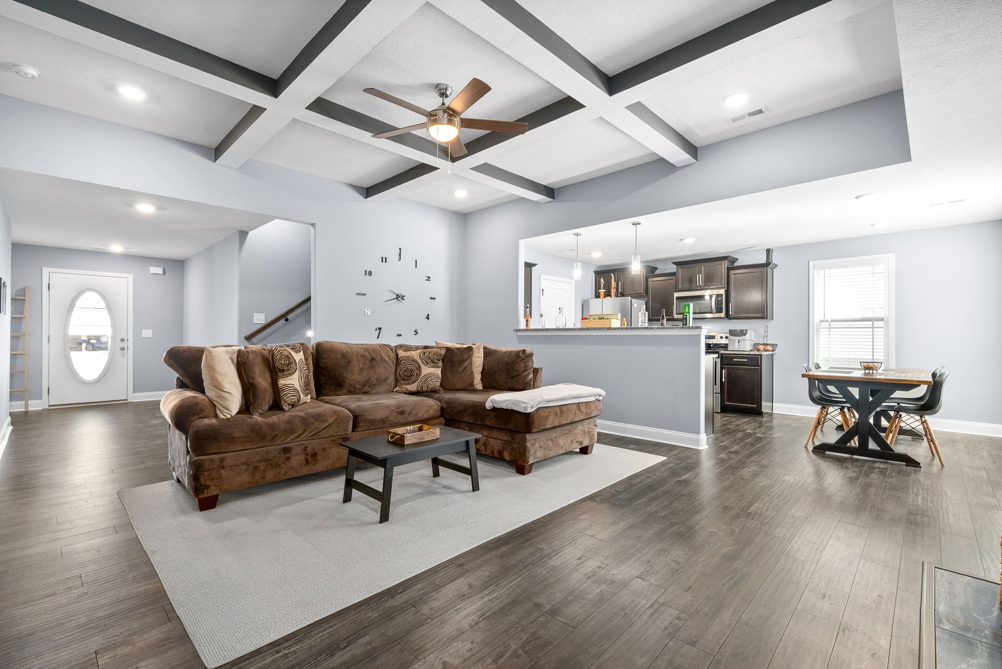 1807 Rains Road Clarksville, TN 37042 - Photo 10 of 39 a living room with furniture kitchen view and a wooden floor