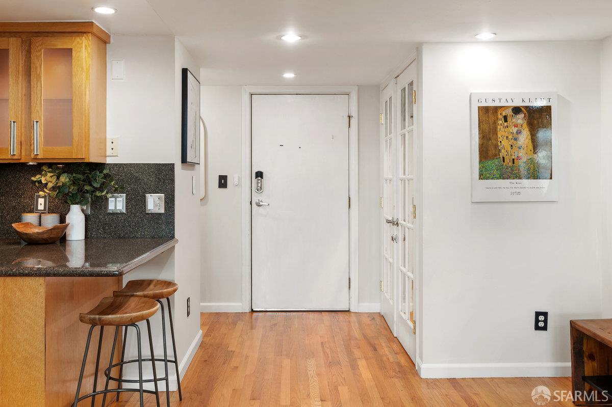 1578 Indiana Street, Unit 8 San Francisco, CA 94107 - Photo 13 of 36 a view of hallway with a large window and chandelier