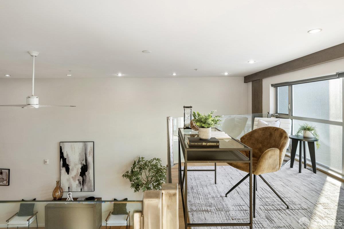 1578 Indiana Street, Unit 8 San Francisco, CA 94107 - Photo 26 of 36 a living room with furniture and wooden floor
