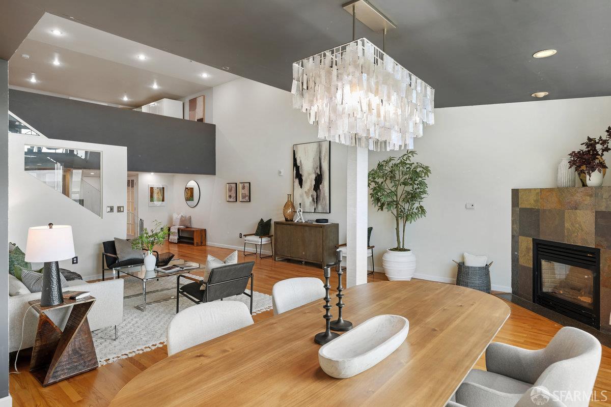 1578 Indiana Street, Unit 8 San Francisco, CA 94107 - Photo 5 of 36 a living room with furniture and a chandelier