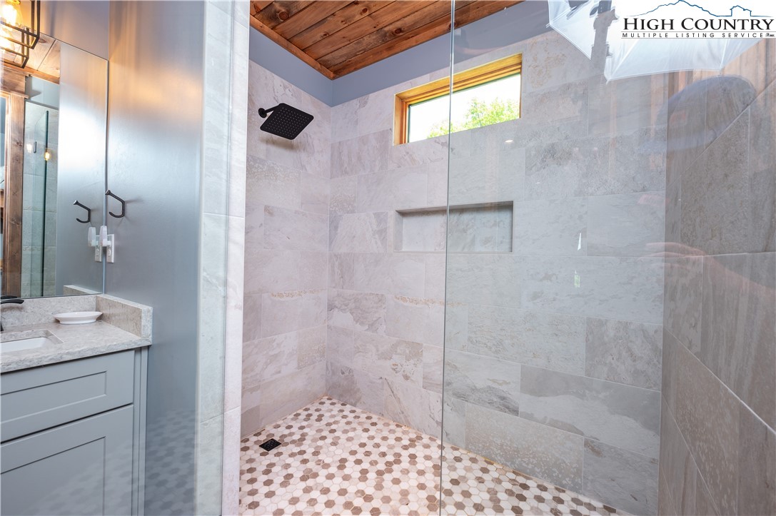 165 Eagle Pass Banner Elk, NC 28604 - Photo 26 of 41 a bathroom with a shower and a sink