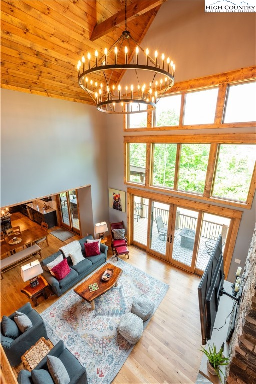 165 Eagle Pass Banner Elk, NC 28604 - Photo 29 of 41 a bed room with furniture and a chandelier