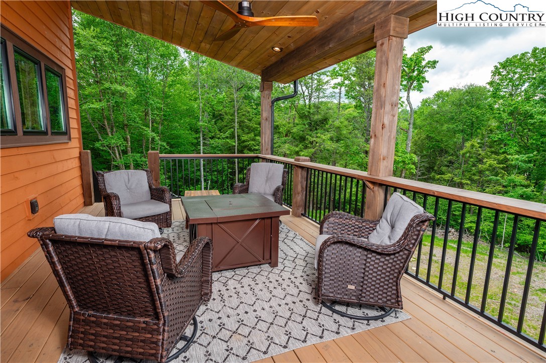 165 Eagle Pass Banner Elk, NC 28604 - Photo 41 of 41 a view of balcony with couch and outdoor seating