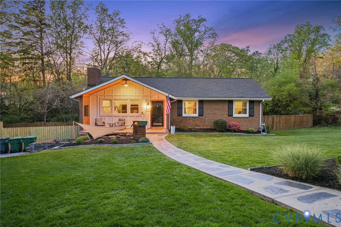 1100 Hollins Road Henrico, VA 23229 - Photo 1 of 38 a front view of a house with a yard