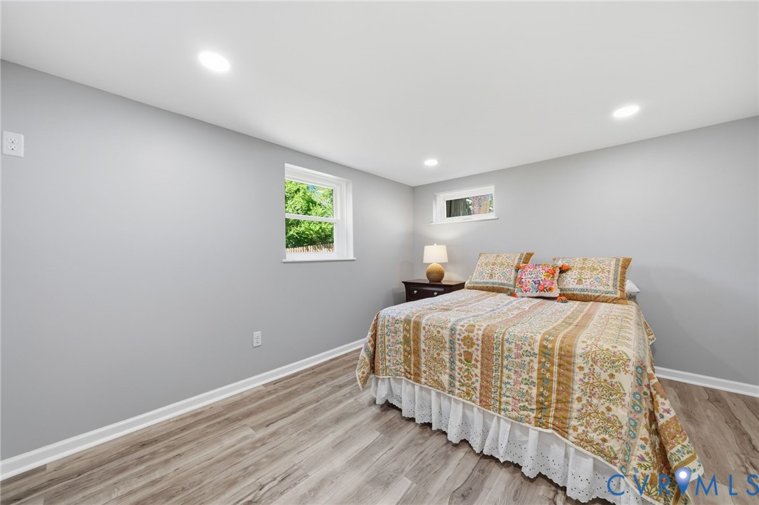 1100 Hollins Road Henrico, VA 23229 - Photo 25 of 38 a bedroom with a bed and window