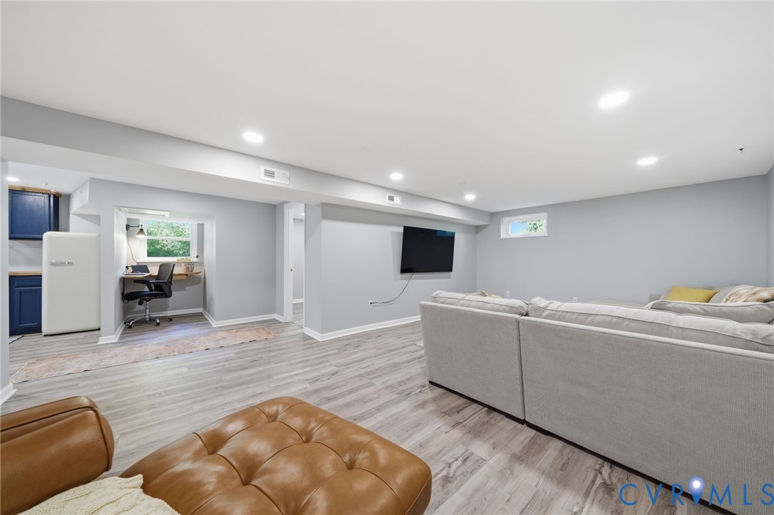 1100 Hollins Road Henrico, VA 23229 - Photo 32 of 38 a living room with furniture and a wooden floor