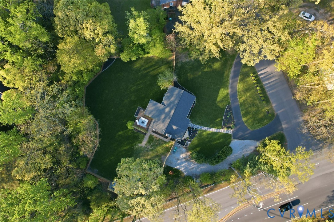 1100 Hollins Road Henrico, VA 23229 - Photo 36 of 38 an aerial view of a house with a yard and lake