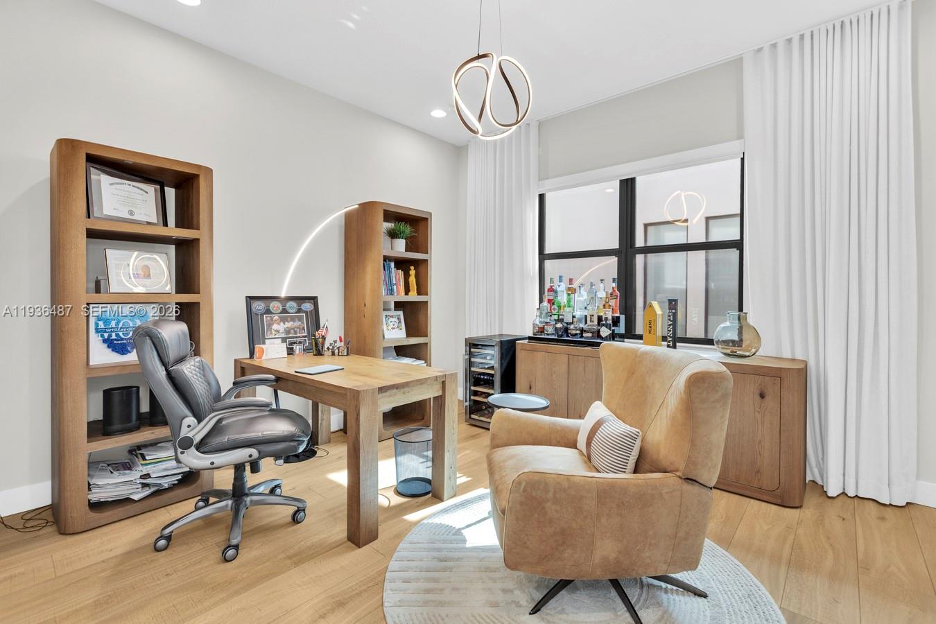 20310 Whistling Straits Way Boca Raton, FL 33434 - Photo 18 of 73 a view of a livingroom with workspace and a couch