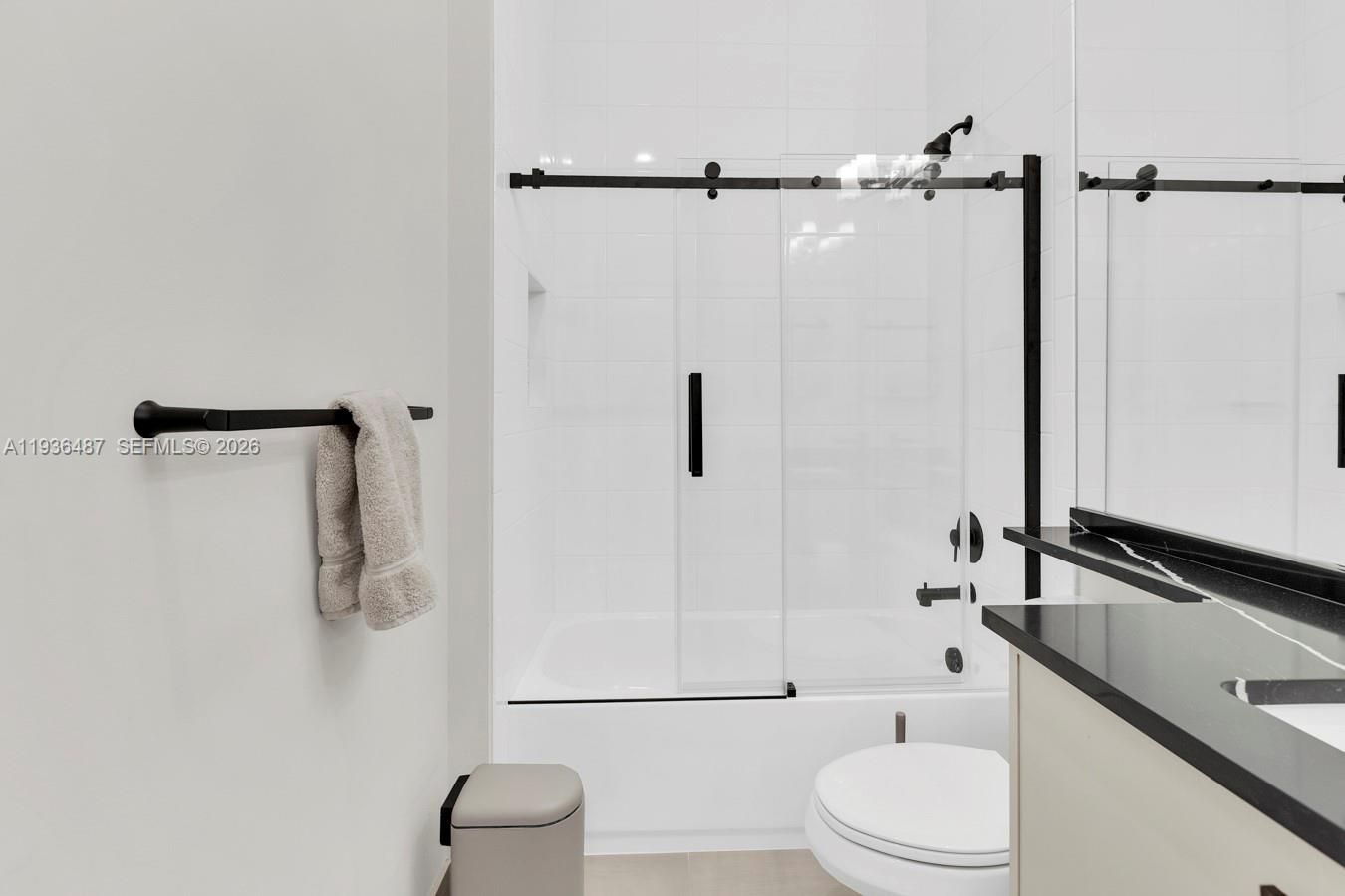 20310 Whistling Straits Way Boca Raton, FL 33434 - Photo 21 of 73 a bathroom with a toilet and a shower