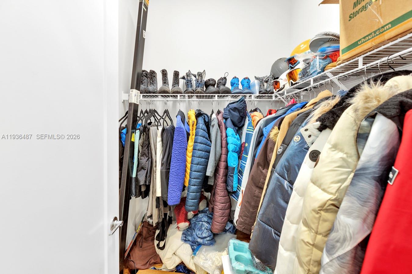 20310 Whistling Straits Way Boca Raton, FL 33434 - Photo 22 of 73 a view of walk in closet with clothes