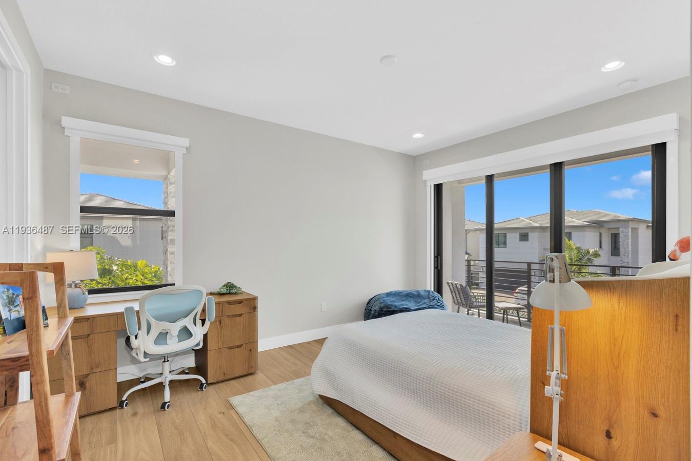 20310 Whistling Straits Way Boca Raton, FL 33434 - Photo 41 of 73 a bedroom with furniture and a large window