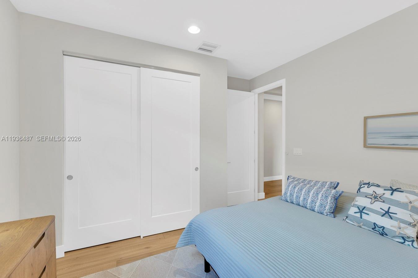 20310 Whistling Straits Way Boca Raton, FL 33434 - Photo 52 of 73 a bedroom with a bed and a night stand