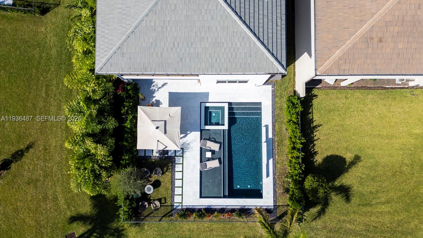 20310 Whistling Straits Way Boca Raton, FL 33434 - Photo 61 of 73 a front view of a house with a yard