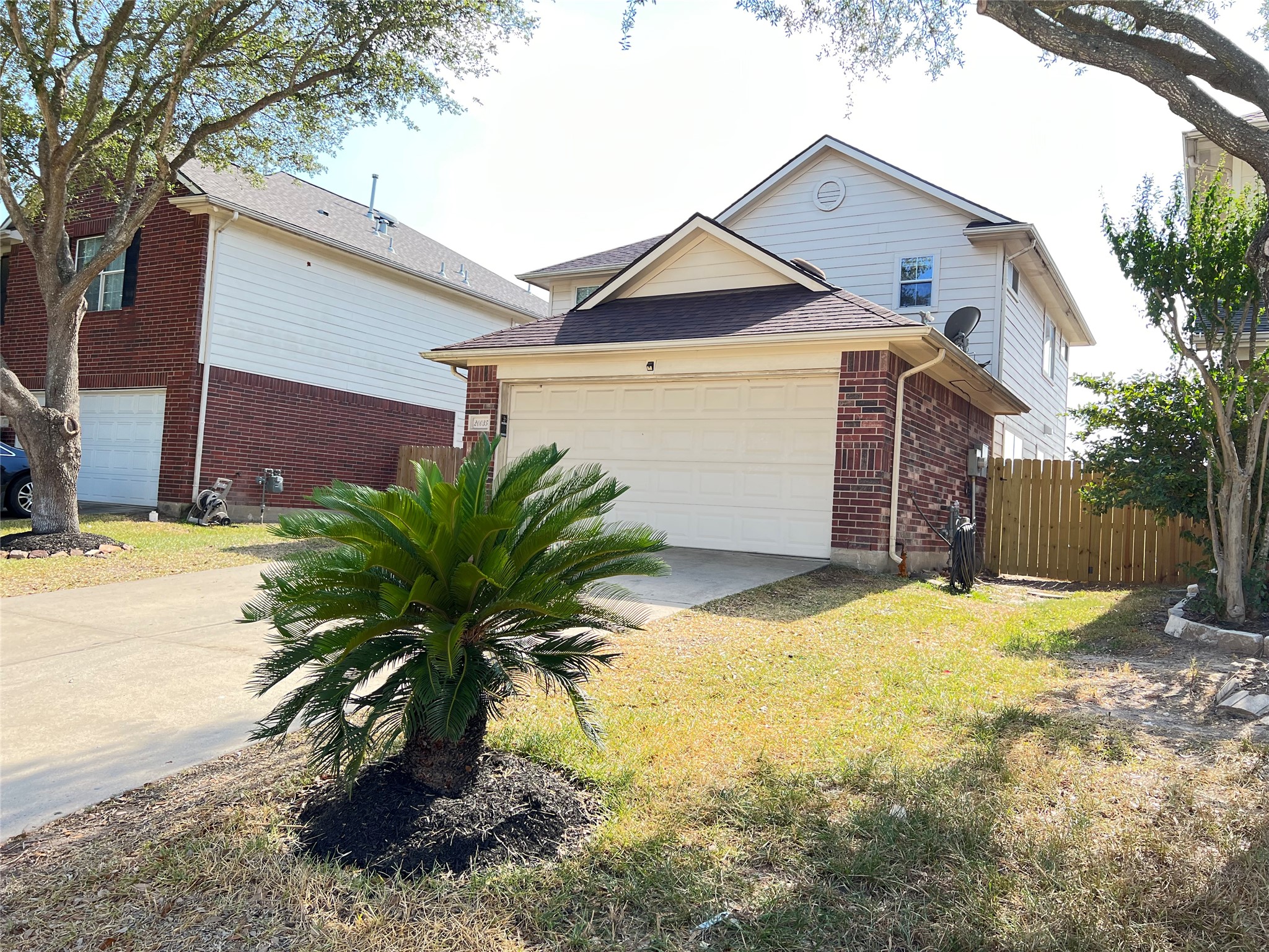 20035 Oland Way Houston, TX 77073 - Photo 2 of 11 a view of a house with a yard