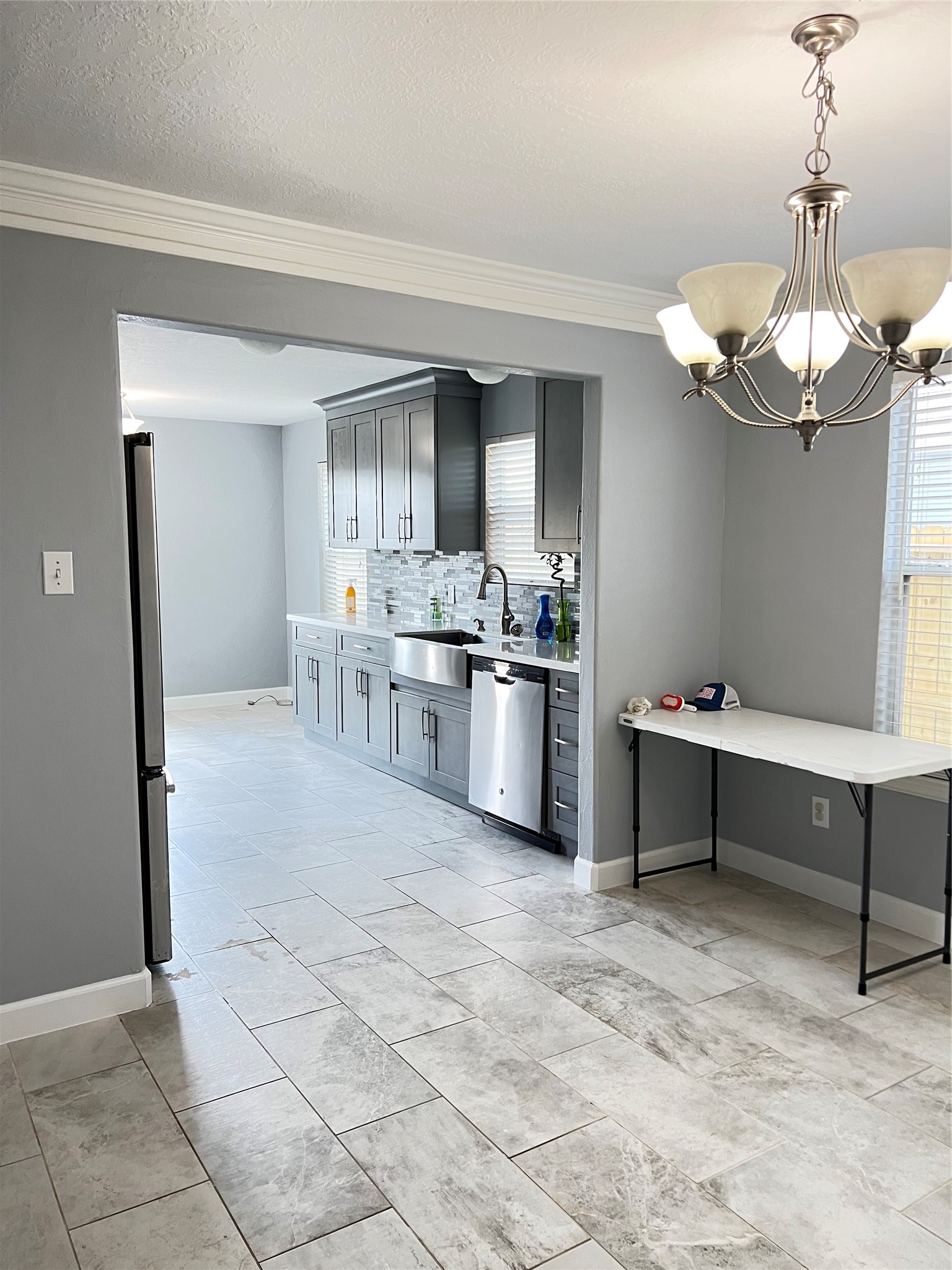 20035 Oland Way Houston, TX 77073 - Photo 6 of 11 a view of a kitchen with a sink and dishwasher kitchen view