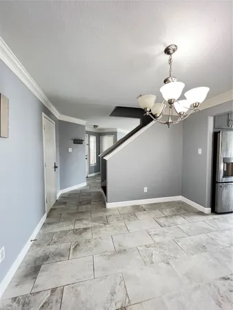 a view of a livingroom with a chandelier