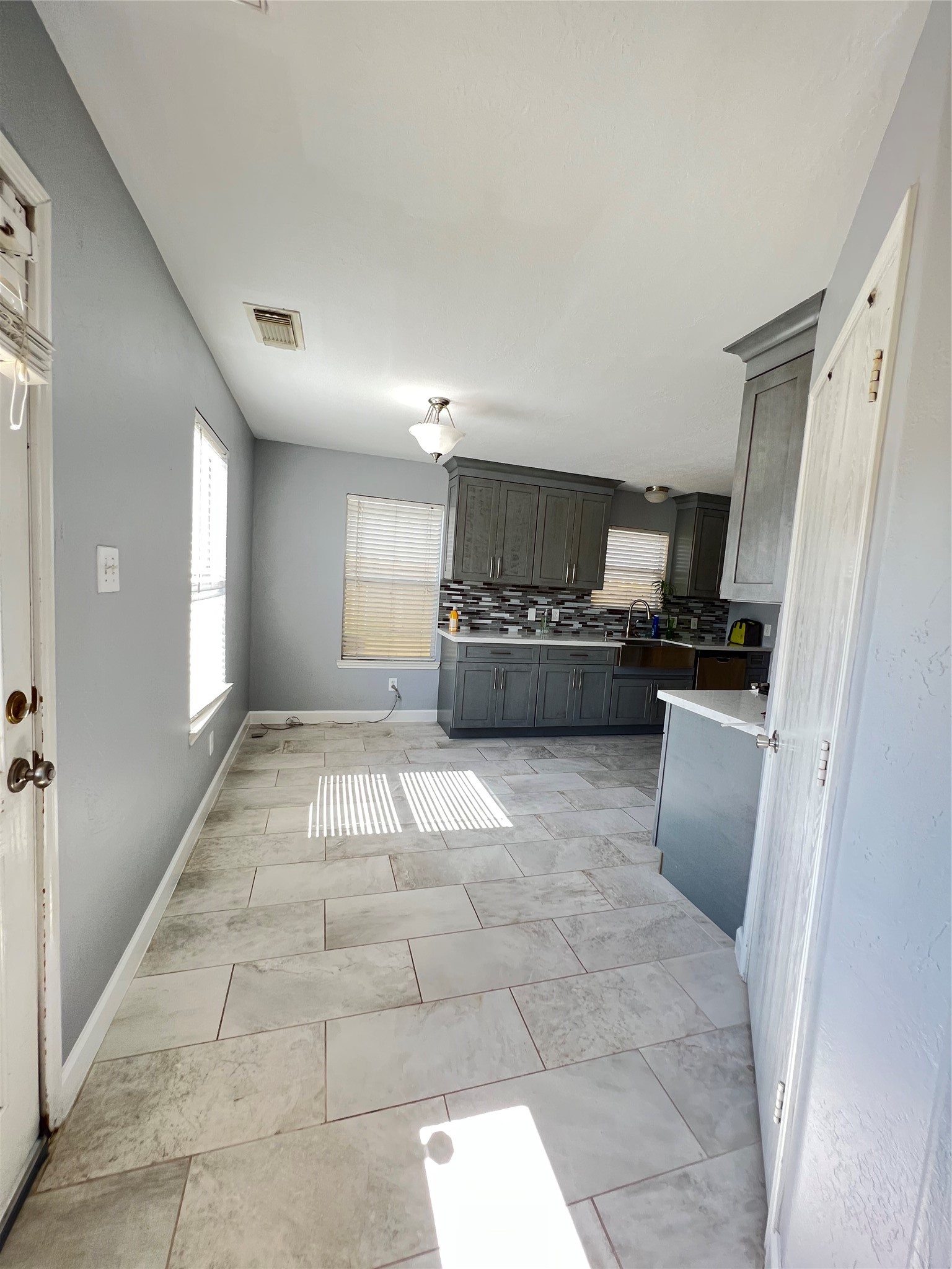 20035 Oland Way Houston, TX 77073 - Photo 9 of 11 a kitchen with refrigerator and microwave