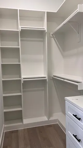 a view of an empty walk in closet