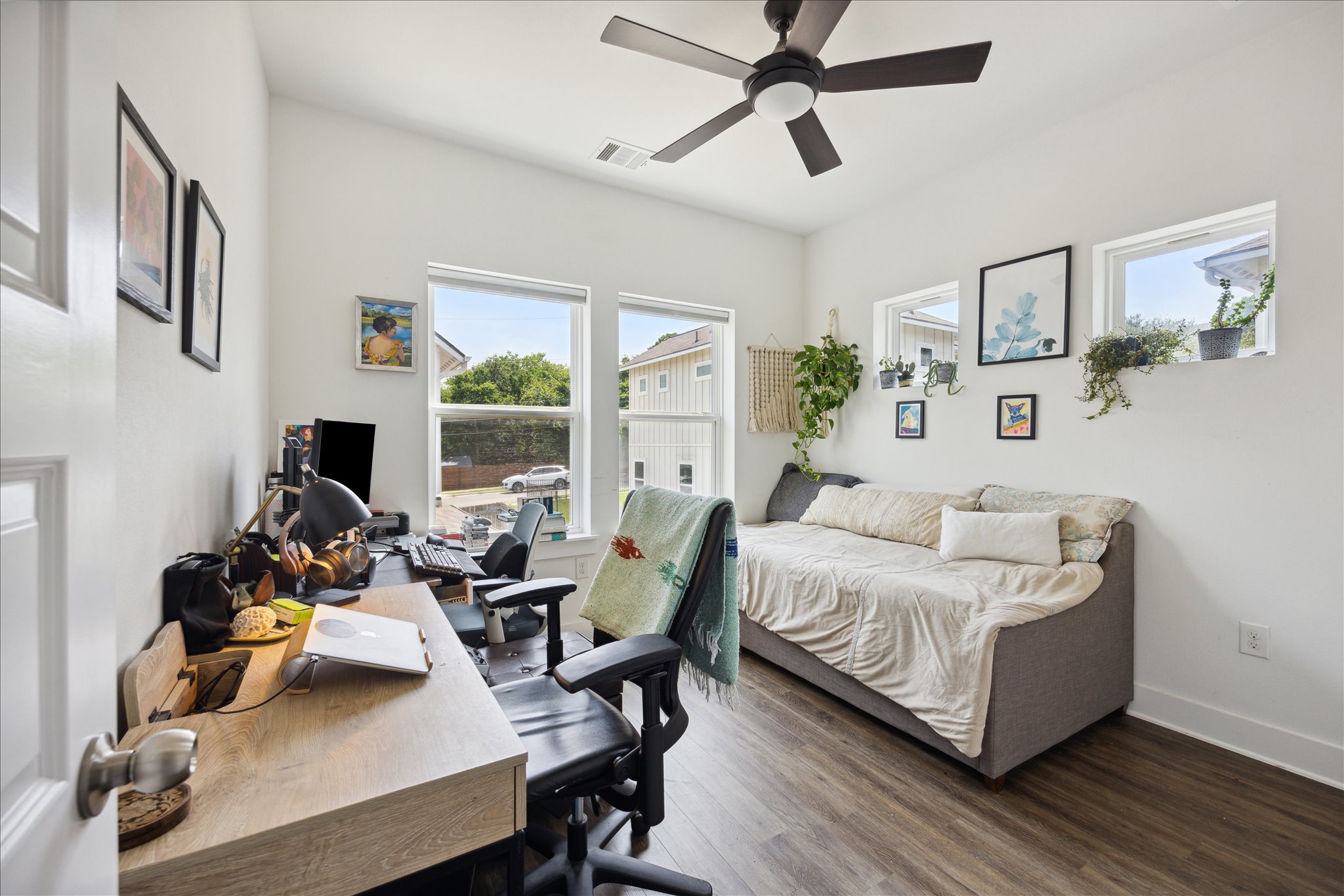 5006 Baker Street, Unit B Austin, TX 78721 - Photo 13 of 16 a living room with furniture and a large window