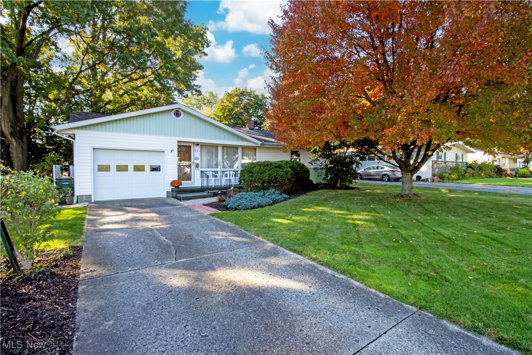 912 Ridgecrest Drive Wooster, OH 44691 - Photo 24 of 27 View of front of home featuring a front lawn and a garage