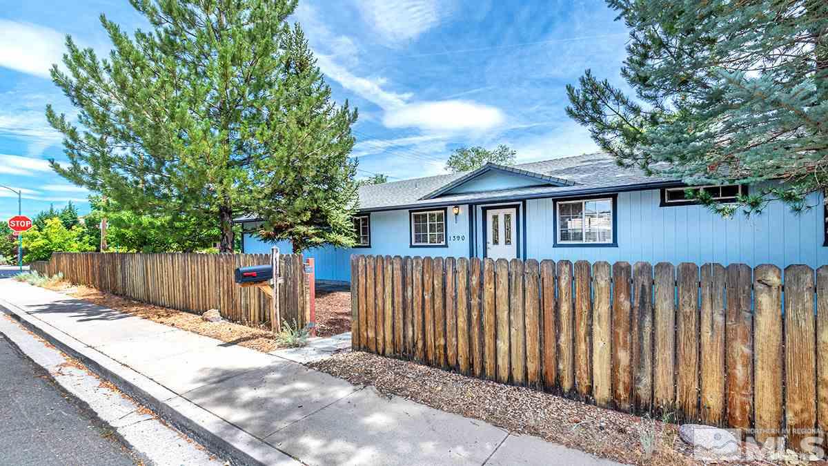 1390 Washington Street Reno, NV 89503 - Photo 15 of 16 a view of a house with wooden fence next to a yard