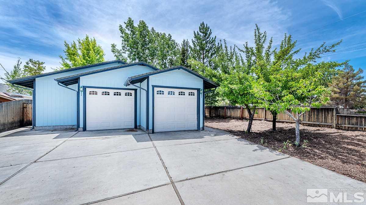 1390 Washington Street Reno, NV 89503 - Photo 16 of 16 a front view of a house with a garden