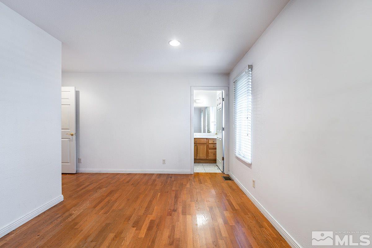 1390 Washington Street Reno, NV 89503 - Photo 8 of 16 a view of a room with wooden floor and a window
