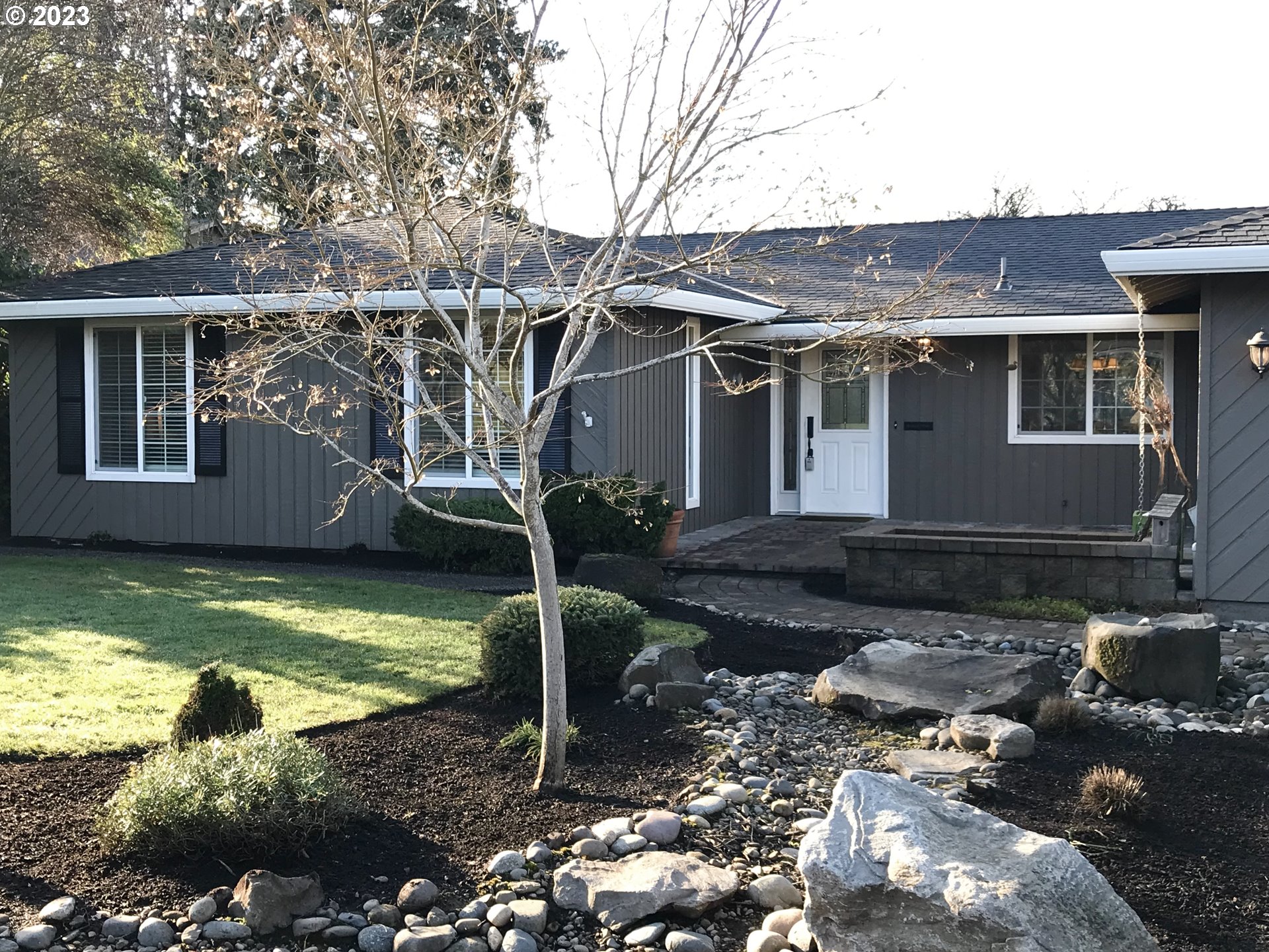 7175 Southwest 173rd Avenue Beaverton, OR 97007 - Photo 2 of 20 a view of a house with backyard