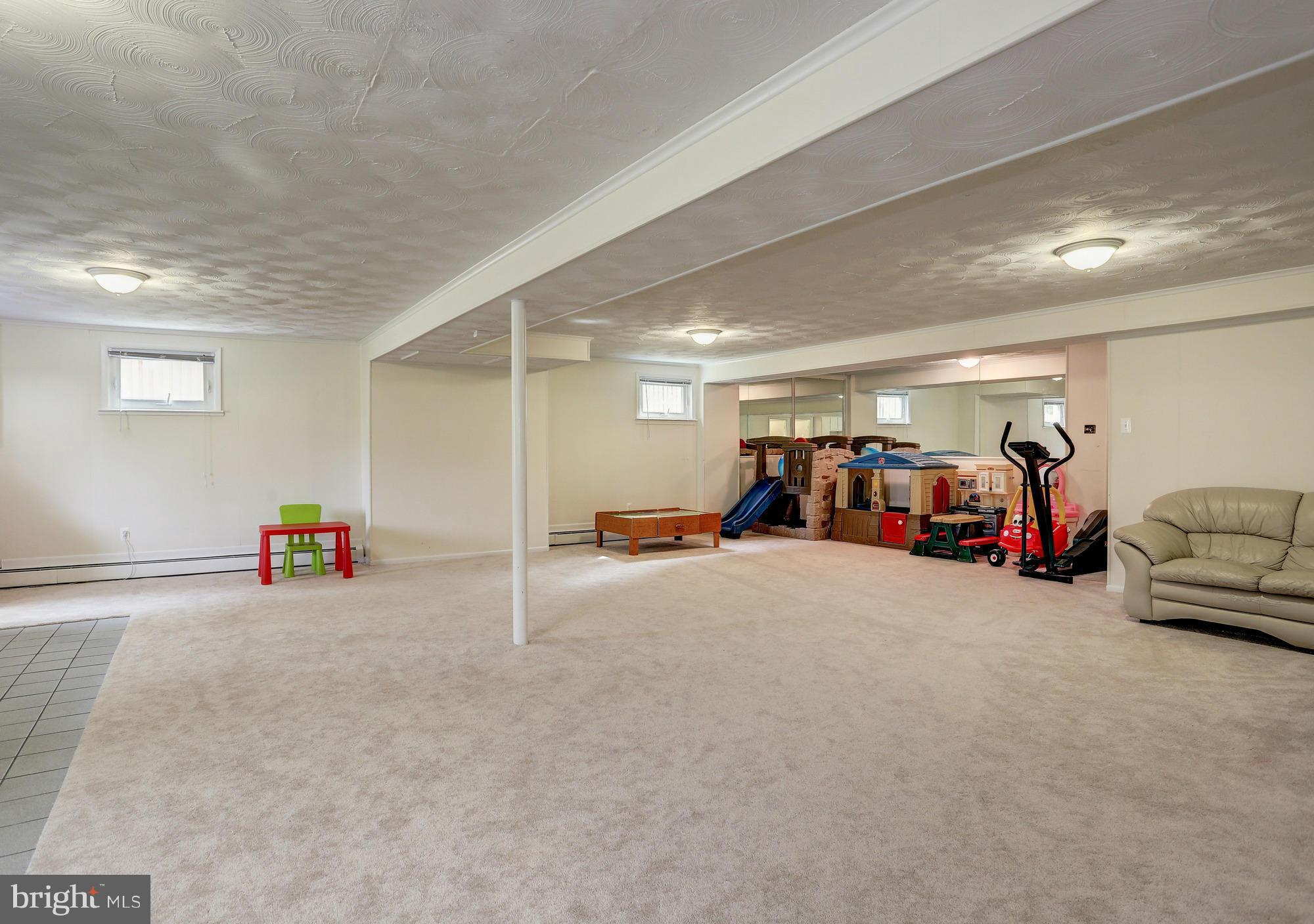14001 Notley Road Silver Spring, MD 20904 - Photo 19 of 30 Huge Rec Room with Level Walk-Out
